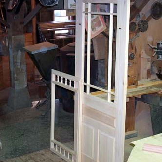 This is an example of a clear pine 9 lite combination with three raised panels and a double ladder screen