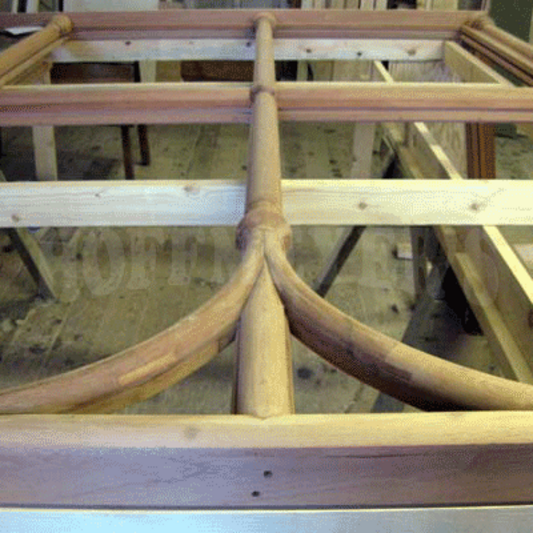 One of the Bayfield windows lies across a pair of sawhorses within the Hoffmeyer's workshop